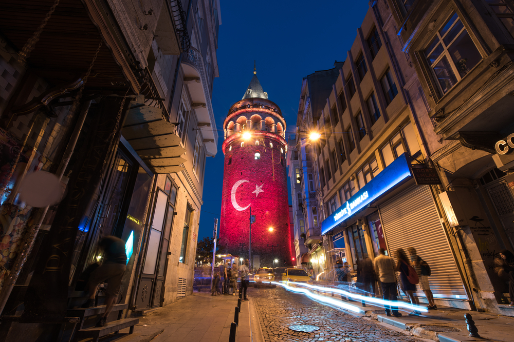 Galata Tower rising above Istanbul's Beyoğlu district with the Bosphorus in the background